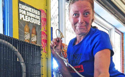 Diane Capararo with the bug-catcher which sparked a blaze at her takeaway store. Diane Capararo with the bug-catcher which sparked a blaze at her takeaway store.